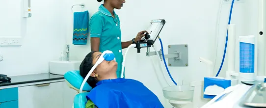 Patient receiving comfortable dental sedation treatment